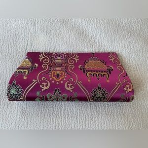 Inspired satin clutch with magnetic closure